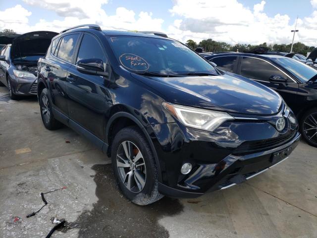 Photo 1 from auction – 2017 TOYOTA RAV4 XLE with VIN 2T3WFREV2HW366020