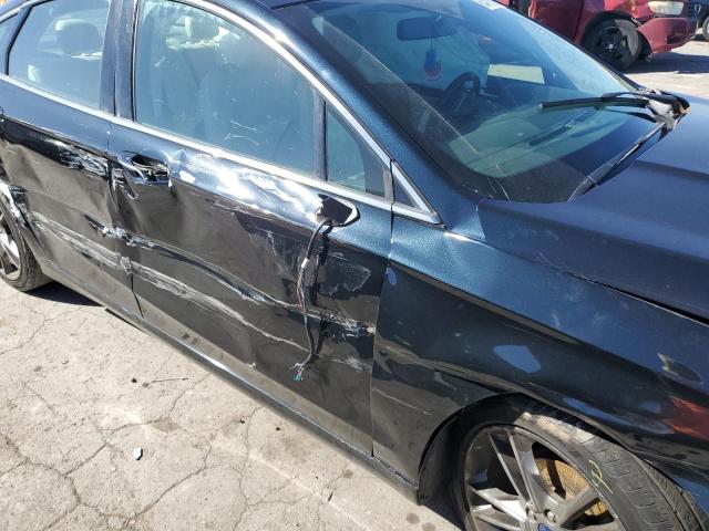 Photo 9 from auction – 2014 FORD FUSION TIT with VIN 3FA6P0K99ER372855