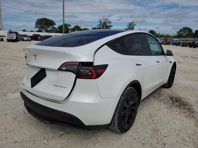 Photo 4 from auction – 2022 TESLA MODEL Y with VIN 7SAYGDEE8NF323377