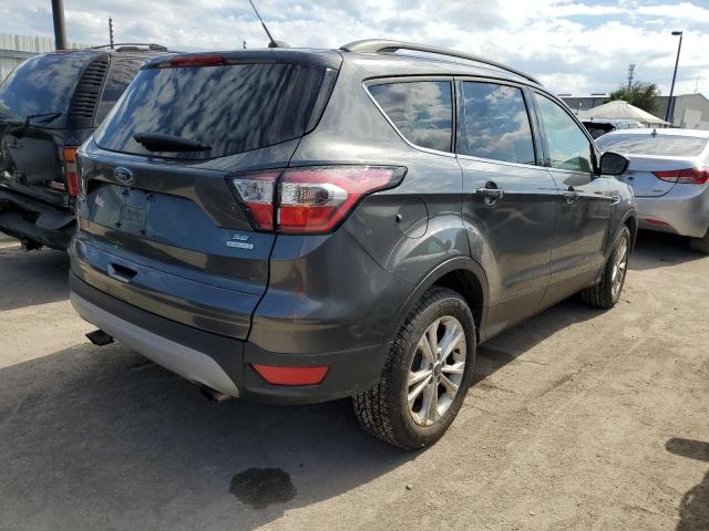 Photo 4 from auction – 2018 FORD ESCAPE SE with VIN 1FMCU0GD0JUA39462