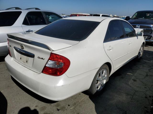 Photo 4 from auction – 2004 TOYOTA CAMRY LE with VIN JTDBE30K040251524