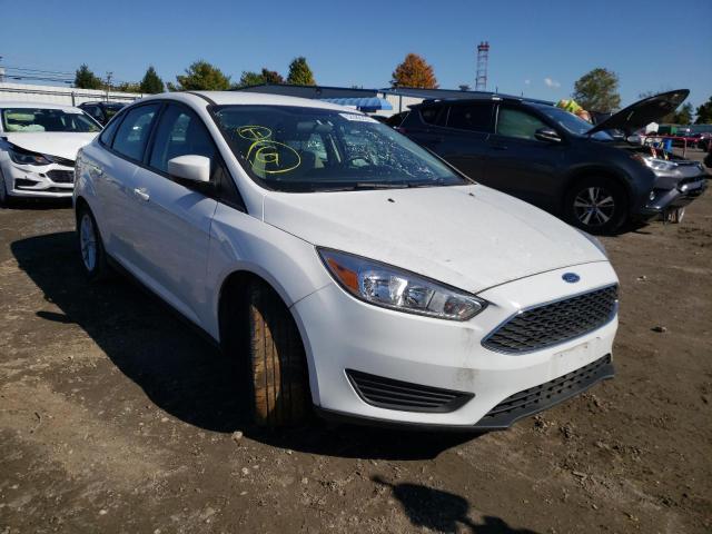 FORD FOCUS SE 2018 with VIN 1FADP3F27JL242104 - Photo from auction