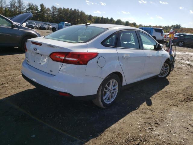 Photo 4 from auction – 2018 FORD FOCUS SE with VIN 1FADP3F27JL242104