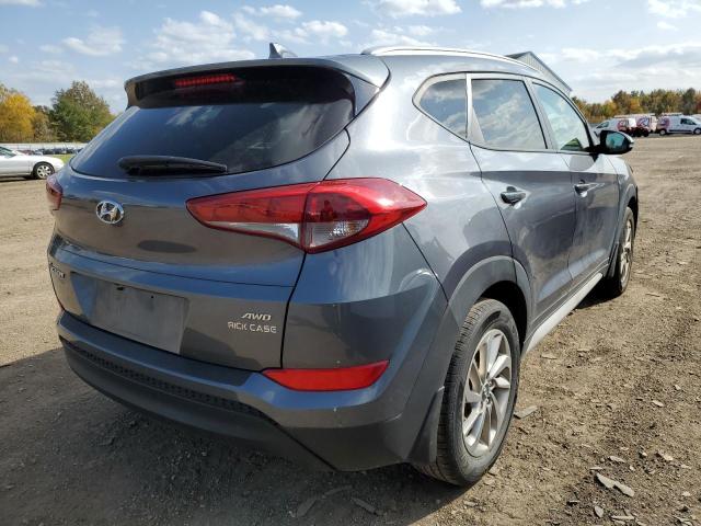 Photo 4 from auction – 2017 HYUNDAI TUCSON LIM with VIN KM8J3CA49HU435145