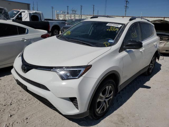 Photo 2 from auction – 2018 TOYOTA RAV4 LE with VIN JTMZFREV4JJ740127