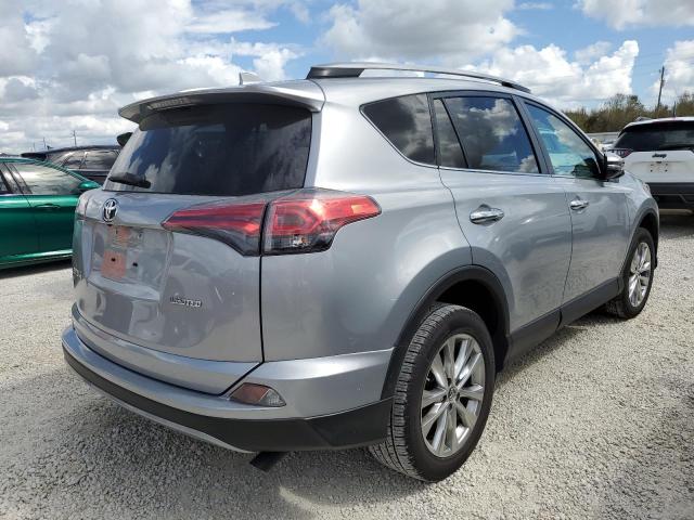 Photo 4 from auction – 2018 TOYOTA RAV4 LIMIT with VIN 2T3YFREV1JW424505