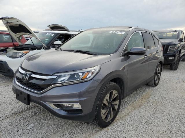 Photo 2 from auction – 2016 HONDA CR-V TOURI with VIN 5J6RM4H97GL109712