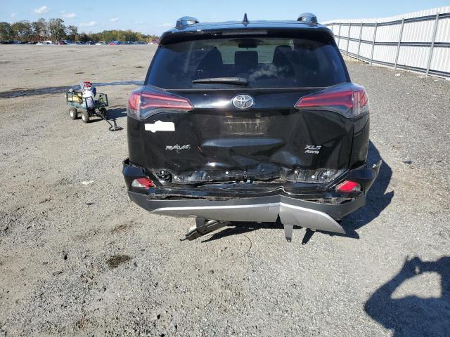 Photo 9 from auction – 2017 TOYOTA RAV4 XLE with VIN 2T3RFREV5HW680855