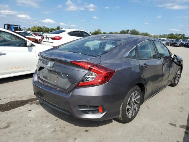 Photo 4 from auction – 2018 HONDA CIVIC EX with VIN 2HGFC2F74JH594303