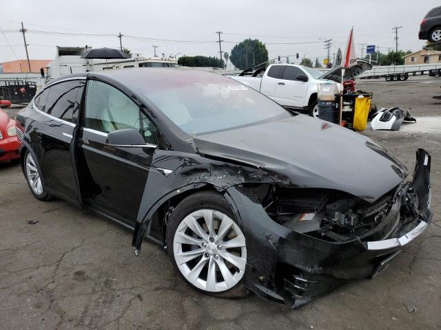 TESLA MODEL X 2017 with VIN 5YJXCBE29HF042935 - Photo from auction