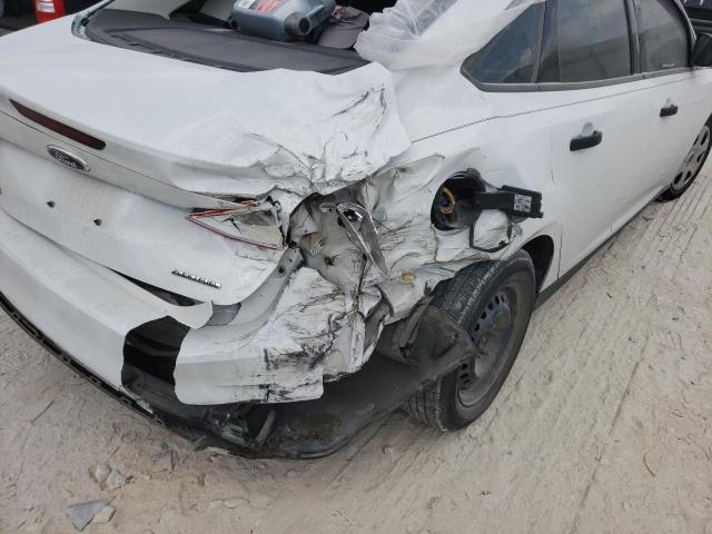 Photo 9 from auction – 2013 FORD FOCUS S with VIN 1FADP3E2XDL381472