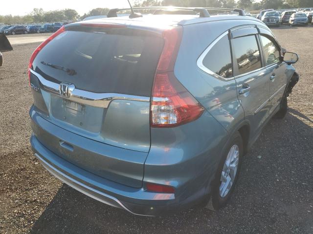 Photo 4 from auction – 2015 HONDA CR-V EXL with VIN 2HKRM3H73FH500809