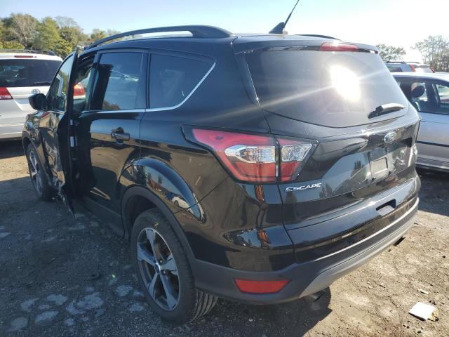 Photo 3 from auction – 2018 FORD ESCAPE SEL with VIN 1FMCU9HD6JUC68117