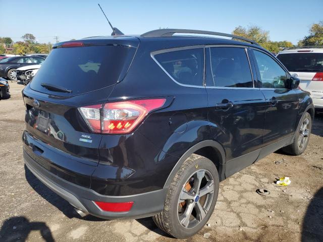 Photo 4 from auction – 2018 FORD ESCAPE SEL with VIN 1FMCU9HD6JUC68117