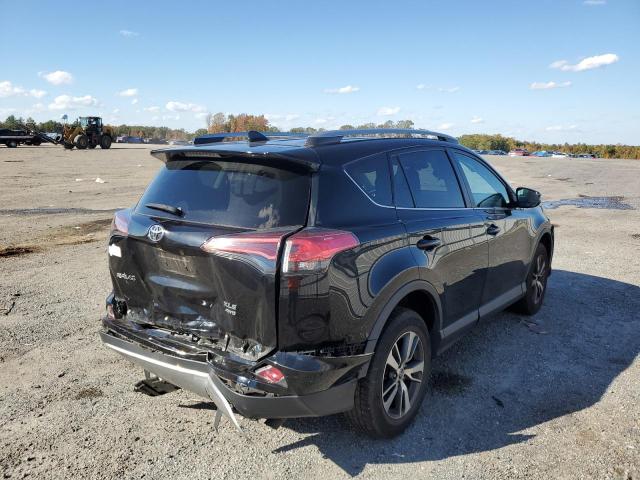 Photo 4 from auction – 2017 TOYOTA RAV4 XLE with VIN 2T3RFREV5HW680855