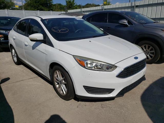 FORD FOCUS SE 2015 with VIN 1FADP3F26FL372754 - Photo from auction