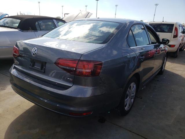 Photo 4 from auction – 2017 VOLKSWAGEN JETTA S with VIN 3VW2B7AJ2HM310918