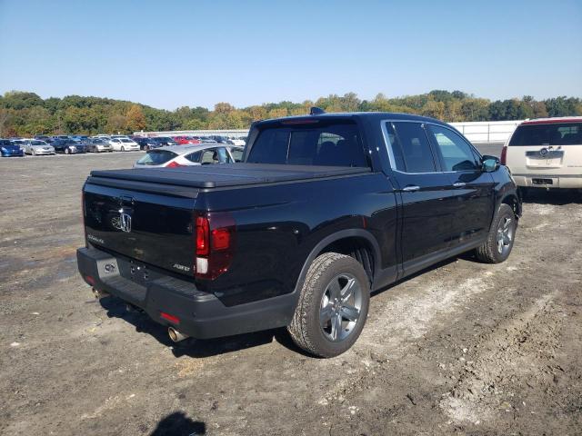 Photo 4 from auction – 2021 HONDA RIDGELINE with VIN 5FPYK3F78MB017209