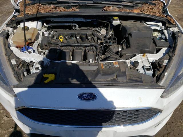Photo 7 from auction – 2018 FORD FOCUS SE with VIN 1FADP3F27JL242104