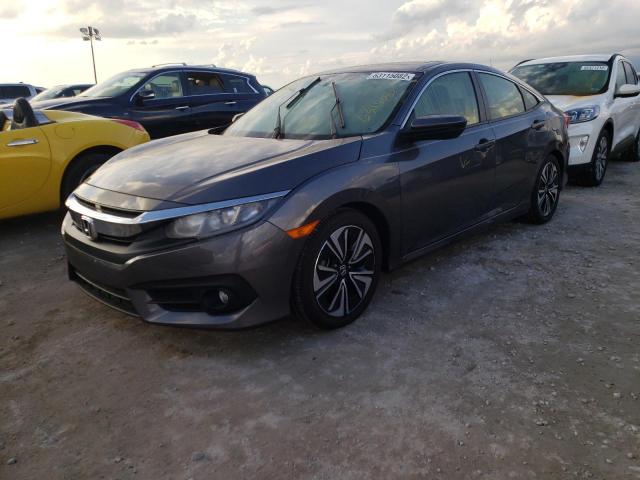 Photo 2 from auction – 2018 HONDA CIVIC EX with VIN JHMFC1F39JX042828