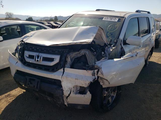 Photo 2 from auction – 2011 HONDA PILOT TOUR with VIN 5FNYF4H97BB106543
