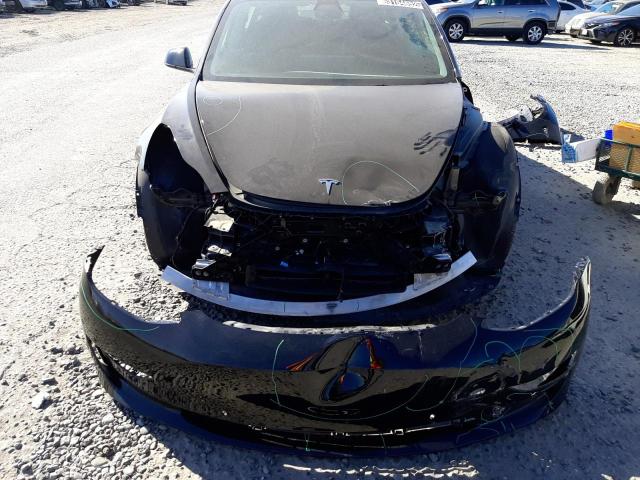 Photo 9 from auction – 2022 TESLA MODEL 3 with VIN 5YJ3E1EA2NF145474