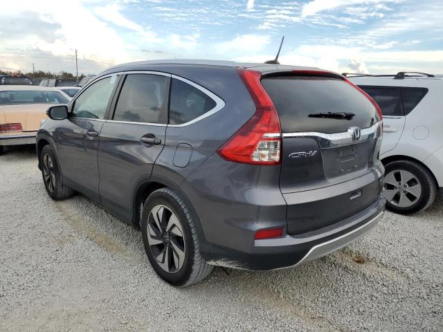 Photo 3 from auction – 2016 HONDA CR-V TOURI with VIN 5J6RM4H97GL109712
