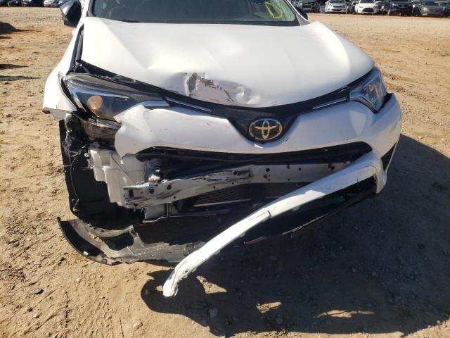 Photo 9 from auction – 2018 TOYOTA RAV4 LE with VIN 2T3ZFREV4JW453694