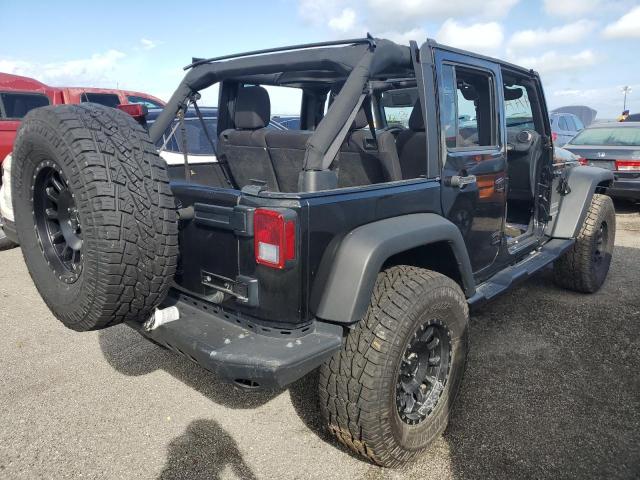 Photo 4 from auction – 2016 JEEP WRANGLER U with VIN 1C4BJWDG0GL130496
