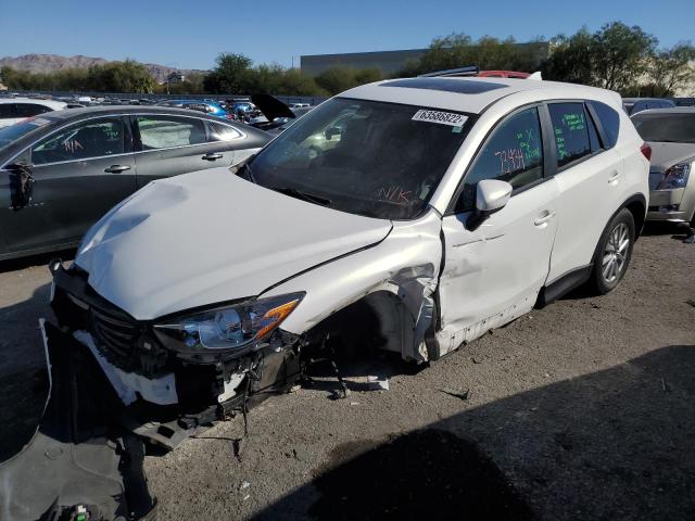 Photo 2 from auction – 2016 MAZDA CX-5 TOURI with VIN JM3KE2CY9G0854591
