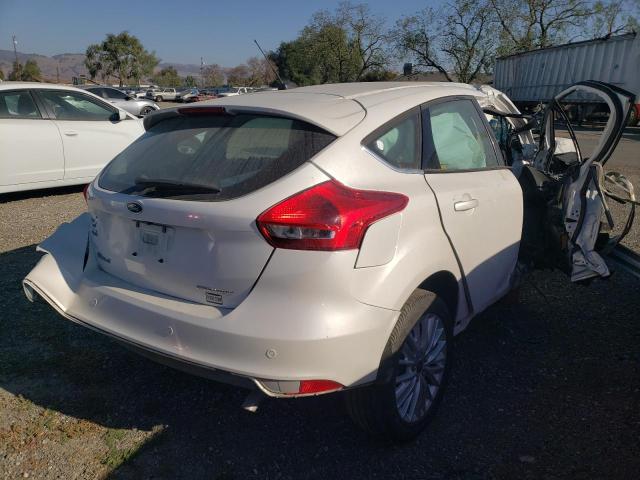 Photo 4 from auction – 2015 FORD FOCUS TITA with VIN 1FADP3N29FL315031
