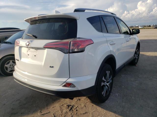Photo 4 from auction – 2016 TOYOTA RAV4 LE with VIN JTMZFREV5GJ075277