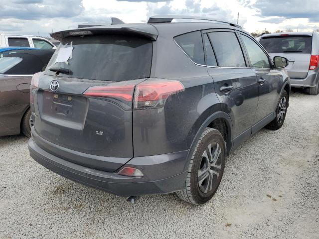 Photo 4 from auction – 2017 TOYOTA RAV4 LE with VIN JTMZFREV6HJ106750