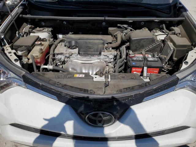 Photo 7 from auction – 2018 TOYOTA RAV4 LE with VIN JTMZFREV4JJ740127