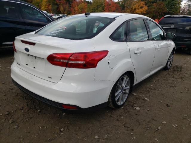 Photo 4 from auction – 2016 FORD FOCUS SE with VIN 1FADP3F21GL303956