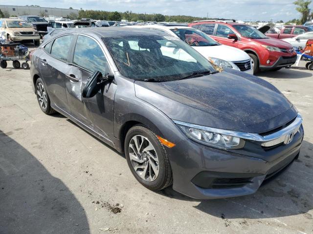 HONDA CIVIC EX 2018 with VIN 2HGFC2F74JH594303 - Photo from auction