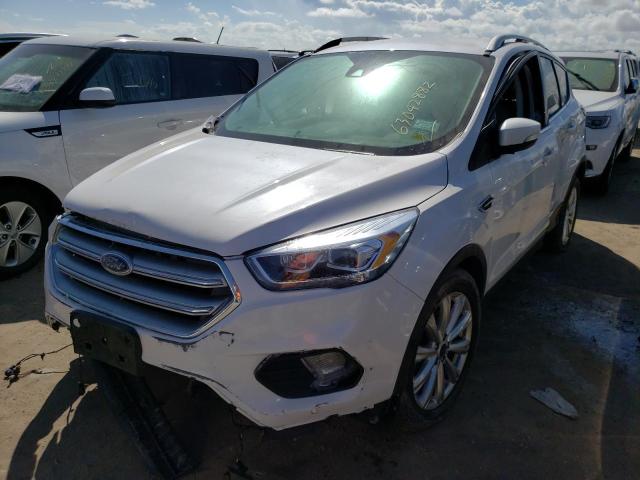 Photo 2 from auction – 2017 FORD ESCAPE TIT with VIN 1FMCU9J93HUA56775