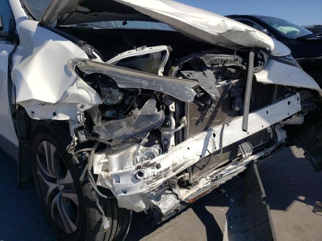 Photo 9 from auction – 2016 TOYOTA RAV4 LE with VIN JTMZFREV0GJ072710