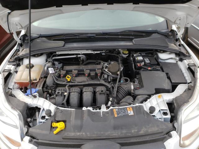 Photo 11 from auction – 2014 FORD FOCUS SE with VIN 1FADP3F29EL427535
