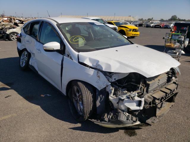 FORD FOCUS SE 2014 con VIN 1FADP3K22EL255046 - Foto de la subasta