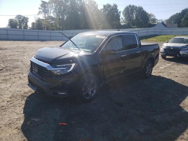 Photo 2 from auction – 2021 HONDA RIDGELINE with VIN 5FPYK3F78MB017209