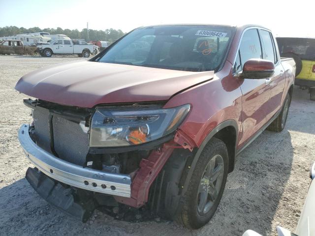Photo 2 from auction – 2022 HONDA RIDGELINE with VIN 5FPYK3F77NB003772