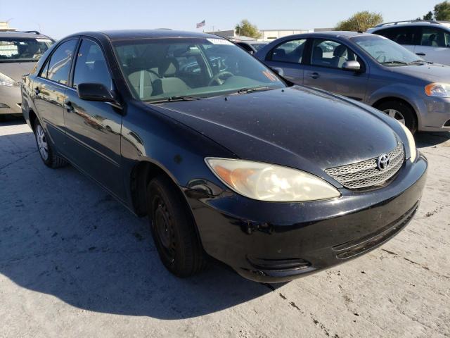 TOYOTA CAMRY LE 2002 with VIN JTDBE32K920128024 - Photo from auction
