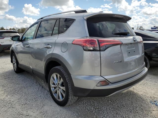Photo 3 from auction – 2018 TOYOTA RAV4 LIMIT with VIN 2T3YFREV1JW424505