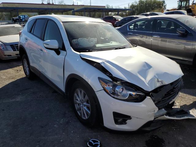 MAZDA CX-5 TOURI 2016 with VIN JM3KE2CY9G0854591 - Photo from auction