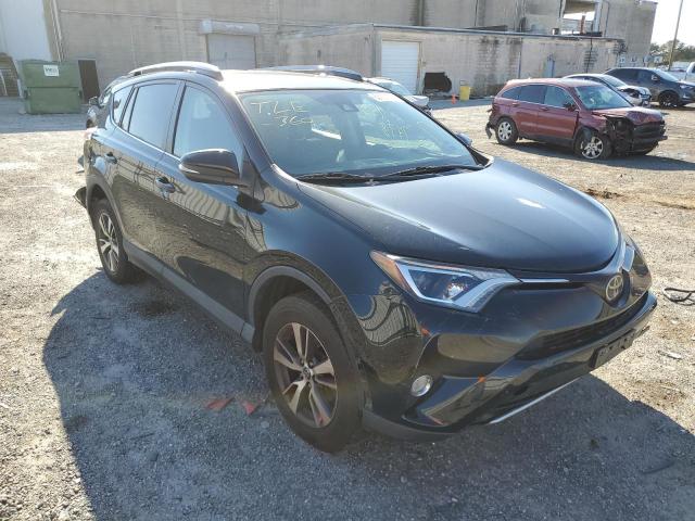 Photo 1 from auction – 2017 TOYOTA RAV4 XLE with VIN 2T3RFREV5HW680855