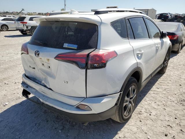 Photo 4 from auction – 2018 TOYOTA RAV4 LE with VIN JTMZFREV4JJ740127