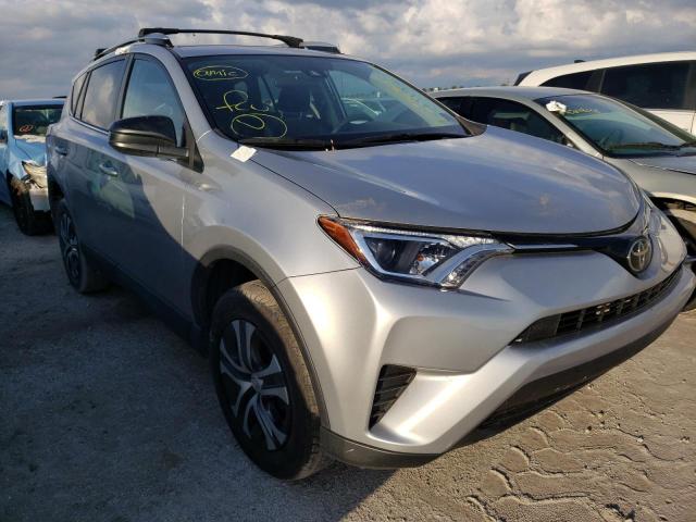 TOYOTA RAV4 LE 2018 with VIN 2T3ZFREV1JW420555 - Photo from auction