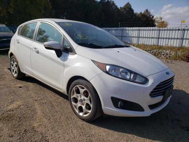 FORD FIESTA SE 2014 with VIN 3FADP4EJ0EM198465 - Photo from auction
