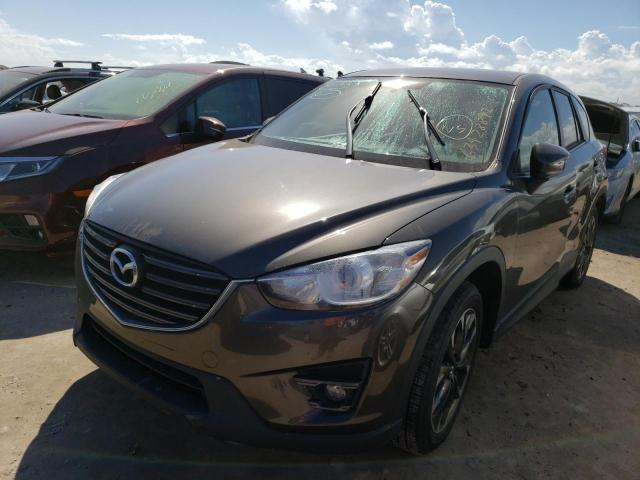 Photo 2 from auction – 2016 MAZDA CX-5 GT with VIN JM3KE4DY4G0914285
